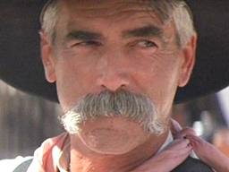 Sam Elliot could ride five horses at once with that mustache...